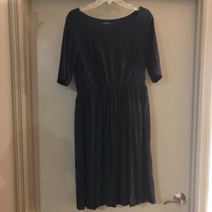 Navy blue lace dress. Full skirt. 3/4 sleeves.